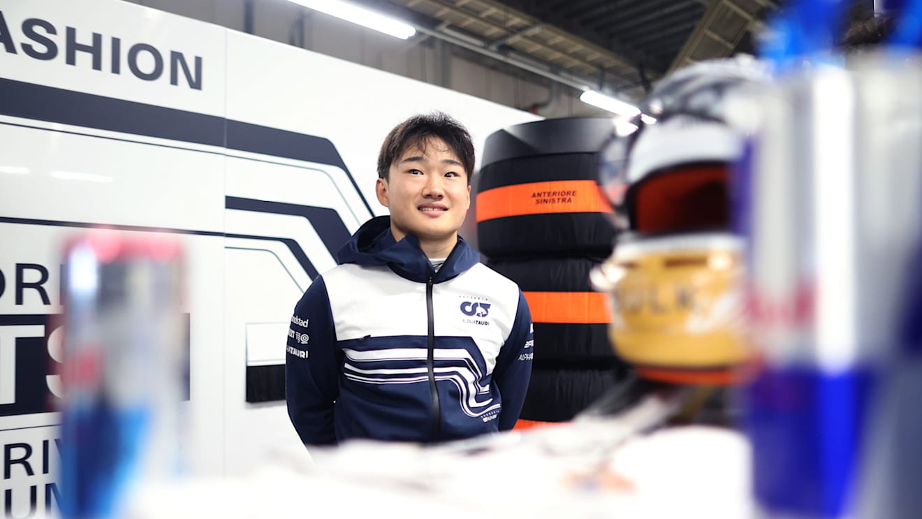 SUZUKA, JAPAN - OCTOBER 09: Yuki Tsunoda of Japan and Scuderia AlphaTauri looks on in the garage during a red flag delay during the F1 Grand Prix of Japan at Suzuka International Racing Course on October 09, 2022 in Suzuka, Japan. (Photo by Peter Fox/Getty Images)