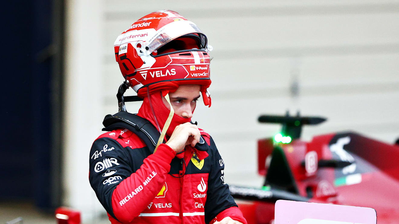 SUZUKA, JAPAN - OCTOBER 09: Third placed Charles Leclerc of Monaco and Ferrari looks on in parc ferme during the F1 Grand Prix of Japan at Suzuka International Racing Course on October 09, 2022 in Suzuka, Japan. (Photo by Clive Rose/Getty Images)