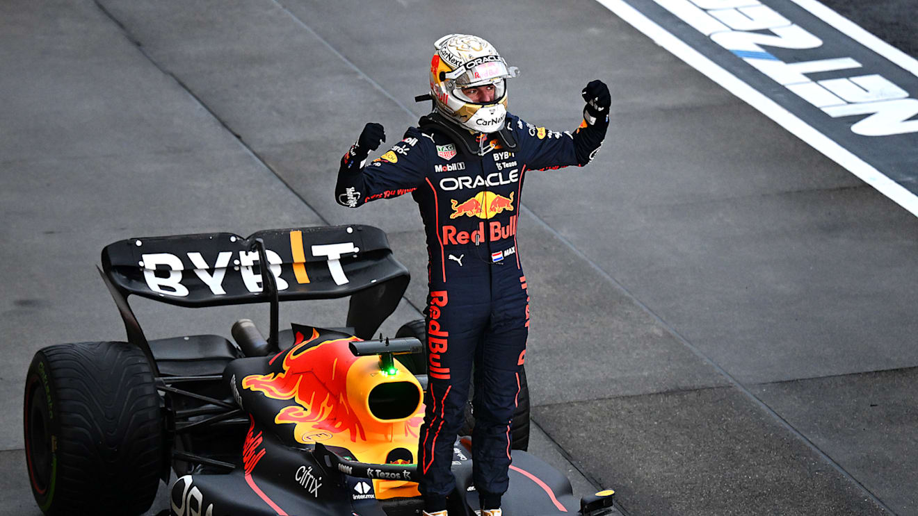 SUZUKA, JAPAN - OCTOBER 09: Race winner and 2022 F1 World Drivers Champion Max Verstappen of Netherlands and Oracle Red Bull Racing celebrates in parc ferme during the F1 Grand Prix of Japan at Suzuka International Racing Course on October 09, 2022 in Suzuka, Japan. (Photo by Clive Mason/Getty Images)