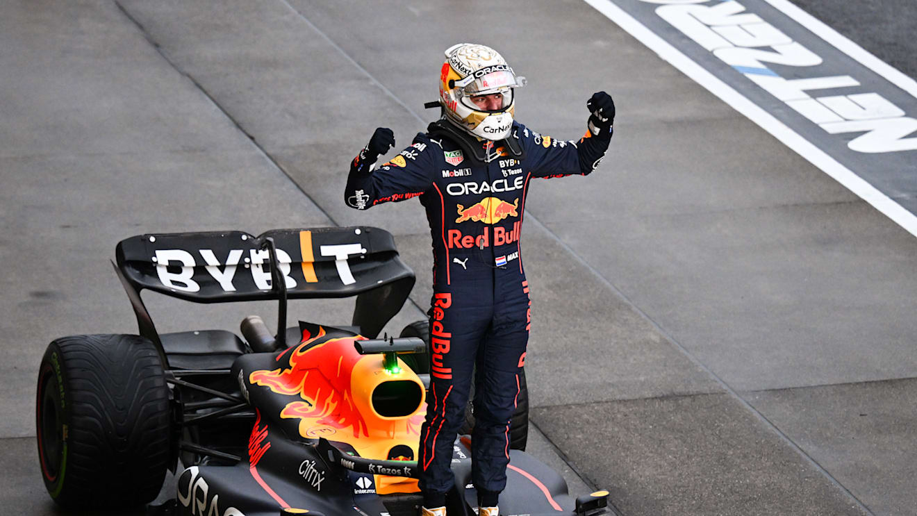 SUZUKA, JAPAN - OCTOBER 09: Race winner and 2022 F1 World Drivers Champion Max Verstappen of Netherlands and Oracle Red Bull Racing celebrates in parc ferme during the F1 Grand Prix of Japan at Suzuka International Racing Course on October 09, 2022 in Suzuka, Japan. (Photo by Clive Mason/Getty Images)