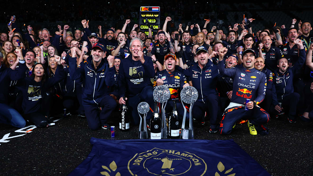 SUZUKA, JAPAN - OCTOBER 09: Race winner and 2022 F1 World Drivers Champion Max Verstappen of Netherlands and Oracle Red Bull Racing celebrates with his team after the F1 Grand Prix of Japan at Suzuka International Racing Course on October 09, 2022 in Suzuka, Japan. (Photo by Dan Istitene - Formula 1/Formula 1 via Getty Images)
