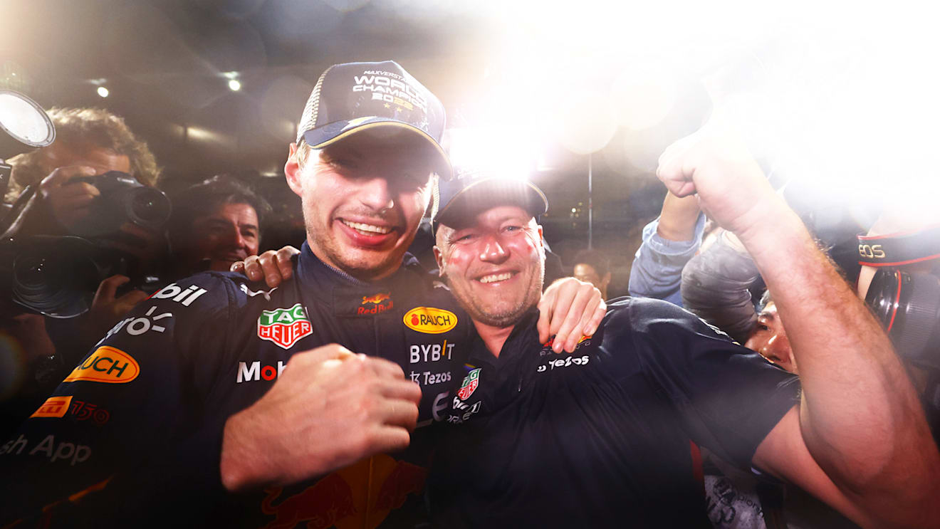 SUZUKA, JAPAN - OCTOBER 09: Race winner and 2022 F1 World Drivers Champion Max Verstappen of Netherlands and Oracle Red Bull Racing celebrates with his team after the F1 Grand Prix of Japan at Suzuka International Racing Course on October 09, 2022 in Suzuka, Japan. (Photo by Mark Thompson/Getty Images )