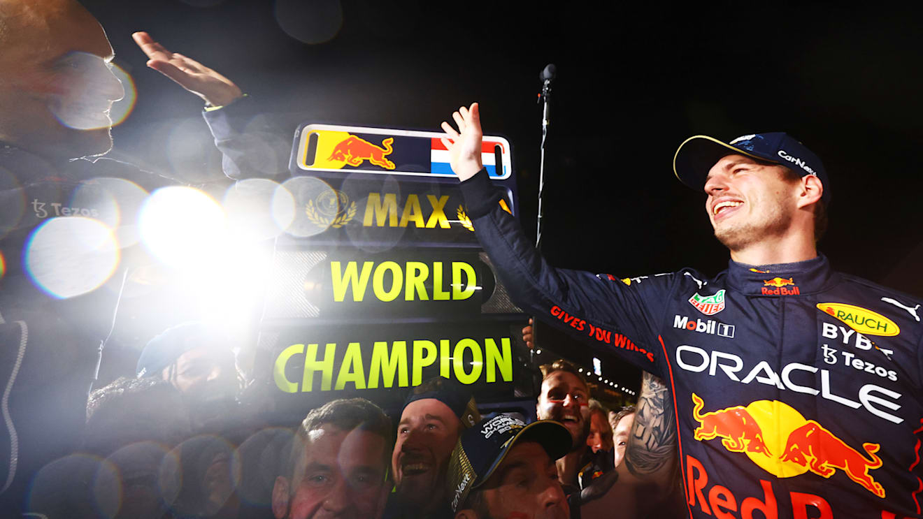 SUZUKA, JAPAN - OCTOBER 09: Race winner and 2022 F1 World Drivers Champion Max Verstappen of Netherlands and Oracle Red Bull Racing celebrates with his team after the F1 Grand Prix of Japan at Suzuka International Racing Course on October 09, 2022 in Suzuka, Japan. (Photo by Mark Thompson/Getty Images )