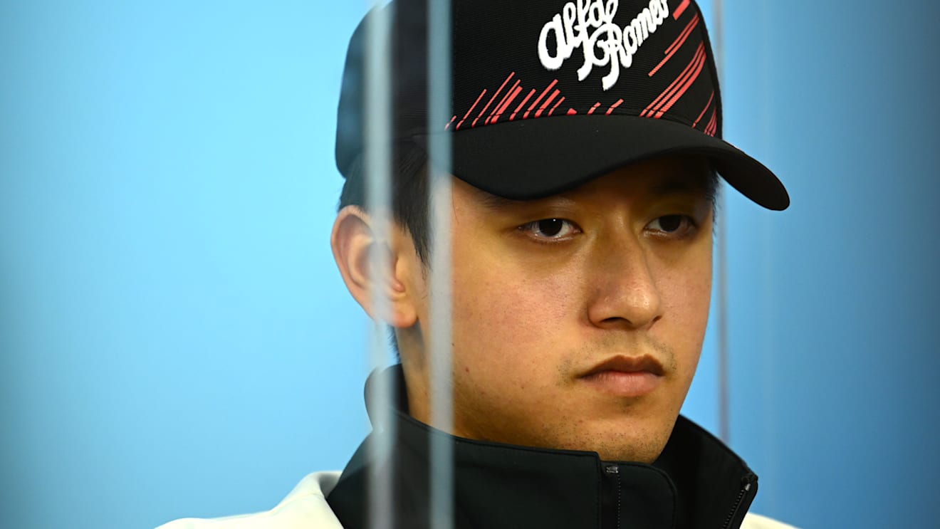 SUZUKA, JAPAN - OCTOBER 06: Zhou Guanyu of China and Alfa Romeo F1 attends the Drivers Press Conference during previews ahead of the F1 Grand Prix of Japan at Suzuka International Racing Course on October 06, 2022 in Suzuka, Japan. (Photo by Clive Mason/Getty Images)