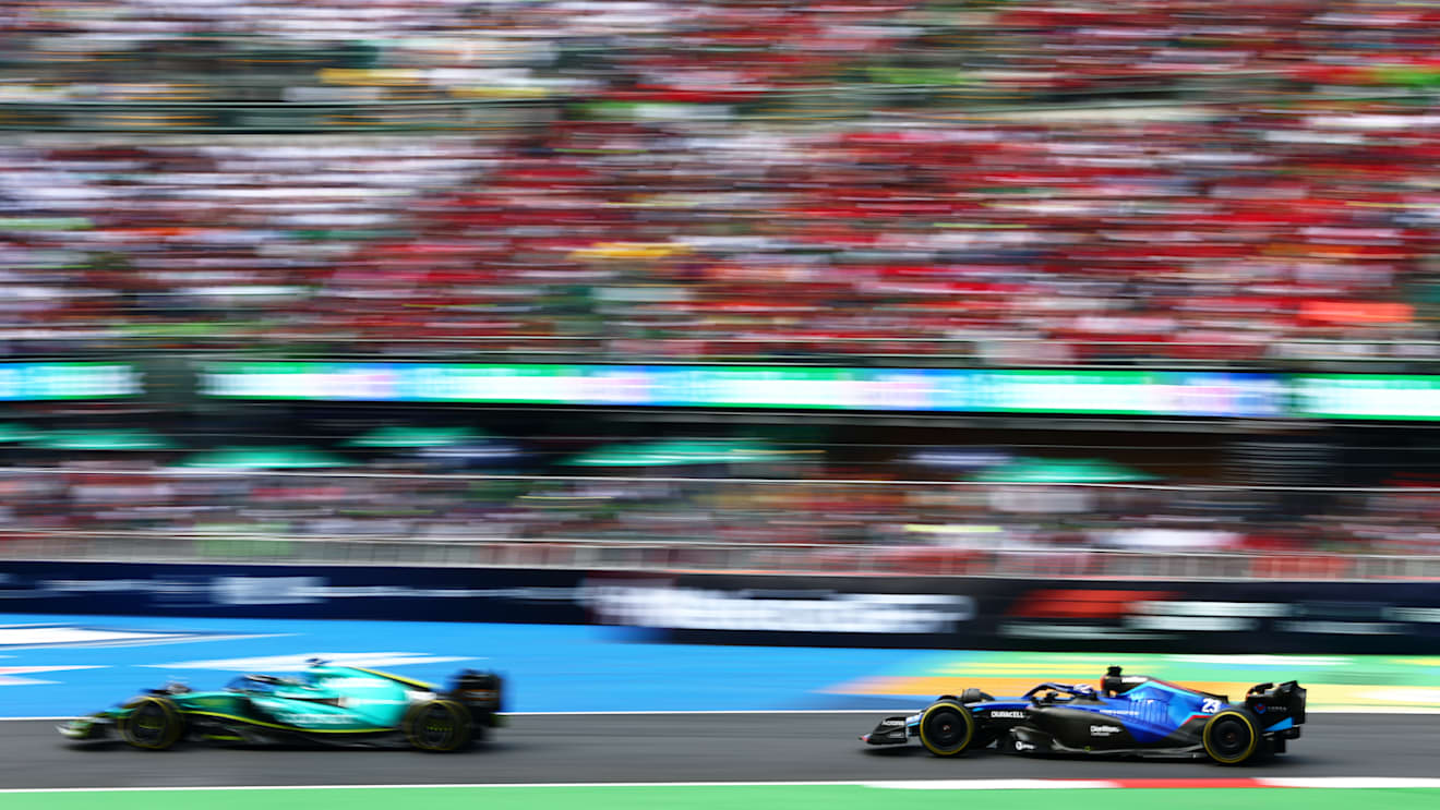 MEXICO CITY, MEXICO - OCTOBER 30: Alexander Albon of Thailand driving the (23) Williams FW44 Mercedes follows Lance Stroll of Canada driving the (18) Aston Martin AMR22 Mercedes during the F1 Grand Prix of Mexico at Autodromo Hermanos Rodriguez on October 30, 2022 in Mexico City, Mexico. (Photo by Dan Istitene - Formula 1/Formula 1 via Getty Images)