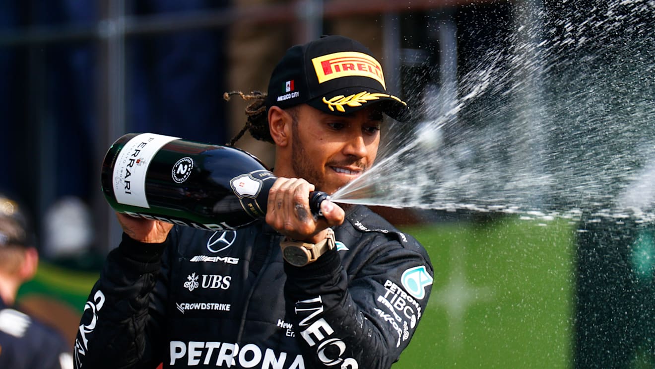 MEXICO CITY, MEXICO - OCTOBER 30: Second placed Lewis Hamilton of Great Britain and Mercedes celebrates on the podium during the F1 Grand Prix of Mexico at Autodromo Hermanos Rodriguez on October 30, 2022 in Mexico City, Mexico. (Photo by Chris Graythen/Getty Images)