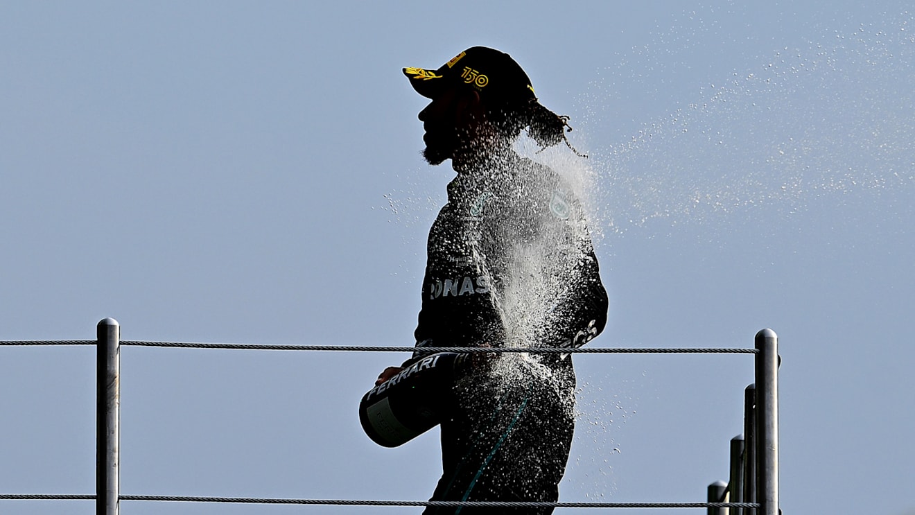 MEXICO CITY, MEXICO - OCTOBER 30: Second placed Lewis Hamilton of Great Britain and Mercedes celebrates on the podium during the F1 Grand Prix of Mexico at Autodromo Hermanos Rodriguez on October 30, 2022 in Mexico City, Mexico. (Photo by Clive Mason - Formula 1/Formula 1 via Getty Images)