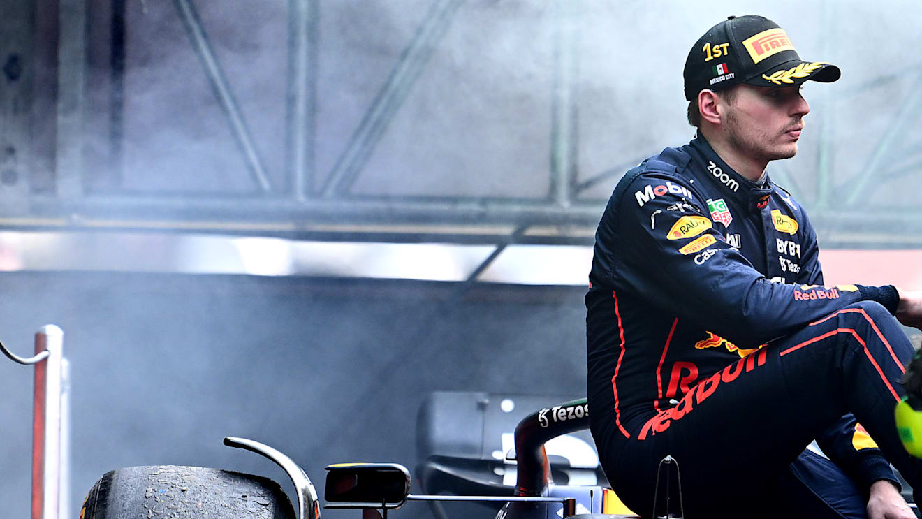 MEXICO CITY, MEXICO - OCTOBER 30: Race winner Max Verstappen of the Netherlands and Oracle Red Bull Racing celebrates on the podium during the F1 Grand Prix of Mexico at Autodromo Hermanos Rodriguez on October 30, 2022 in Mexico City, Mexico. (Photo by Clive Mason - Formula 1/Formula 1 via Getty Images)