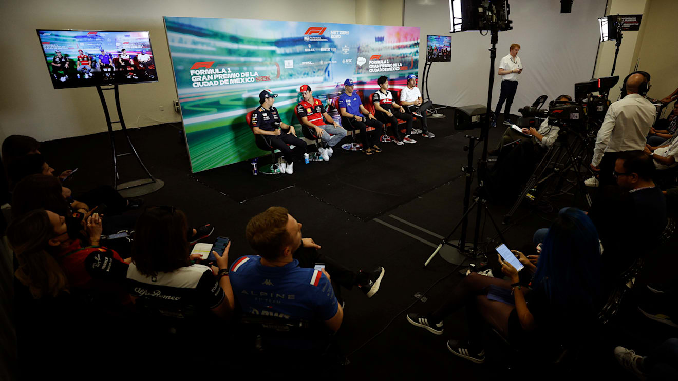 MEXICO CITY, MEXICO - OCTOBER 27: (L-R) Sergio Perez of Mexico and Oracle Red Bull Racing, Charles Leclerc of Monaco and Ferrari, Mick Schumacher of Germany and Haas F1, Zhou Guanyu of China and Alfa Romeo F1 and Fernando Alonso of Spain and Alpine F1 attend the Drivers Press Conference  during previews ahead of the F1 Grand Prix of Mexico at Autodromo Hermanos Rodriguez on October 27, 2022 in Mexico City, Mexico. (Photo by Jared C. Tilton/Getty Images)