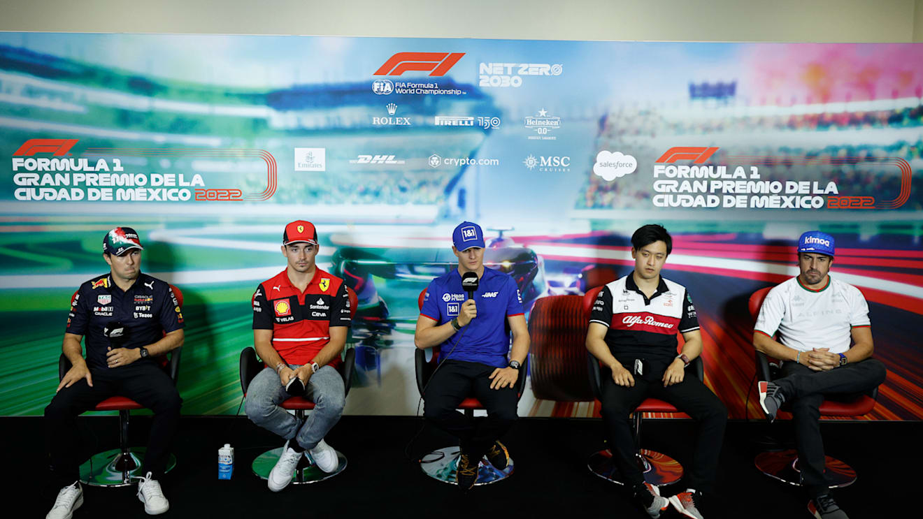 MEXICO CITY, MEXICO - OCTOBER 27: (L-R) Sergio Perez of Mexico and Oracle Red Bull Racing, Charles Leclerc of Monaco and Ferrari, Mick Schumacher of Germany and Haas F1, Zhou Guanyu of China and Alfa Romeo F1 and Fernando Alonso of Spain and Alpine F1 attend the Drivers Press Conference  during previews ahead of the F1 Grand Prix of Mexico at Autodromo Hermanos Rodriguez on October 27, 2022 in Mexico City, Mexico. (Photo by Jared C. Tilton/Getty Images)