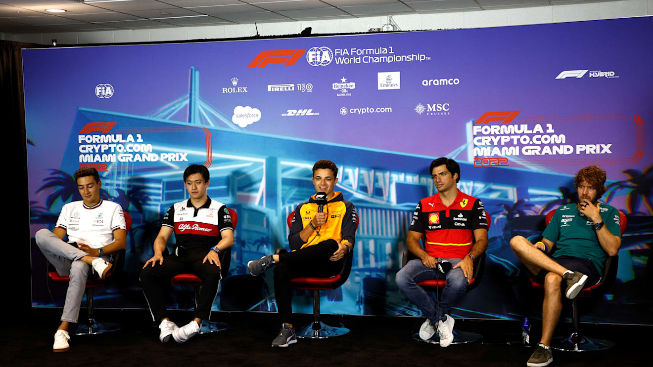 MIAMI, FLORIDA - MAY 06: (L-R) George Russell of Great Britain and Mercedes, Zhou Guanyu of China and Alfa Romeo F1, Lando Norris of Great Britain and McLaren, Carlos Sainz of Spain and Ferrari and Sebastian Vettel of Germany and Aston Martin F1 Team attend the Drivers Press Conference prior to practice ahead of the F1 Grand Prix of Miami at the Miami International Autodrome on May 06, 2022 in Miami, Florida. (Photo by Jared C. Tilton/Getty Images)