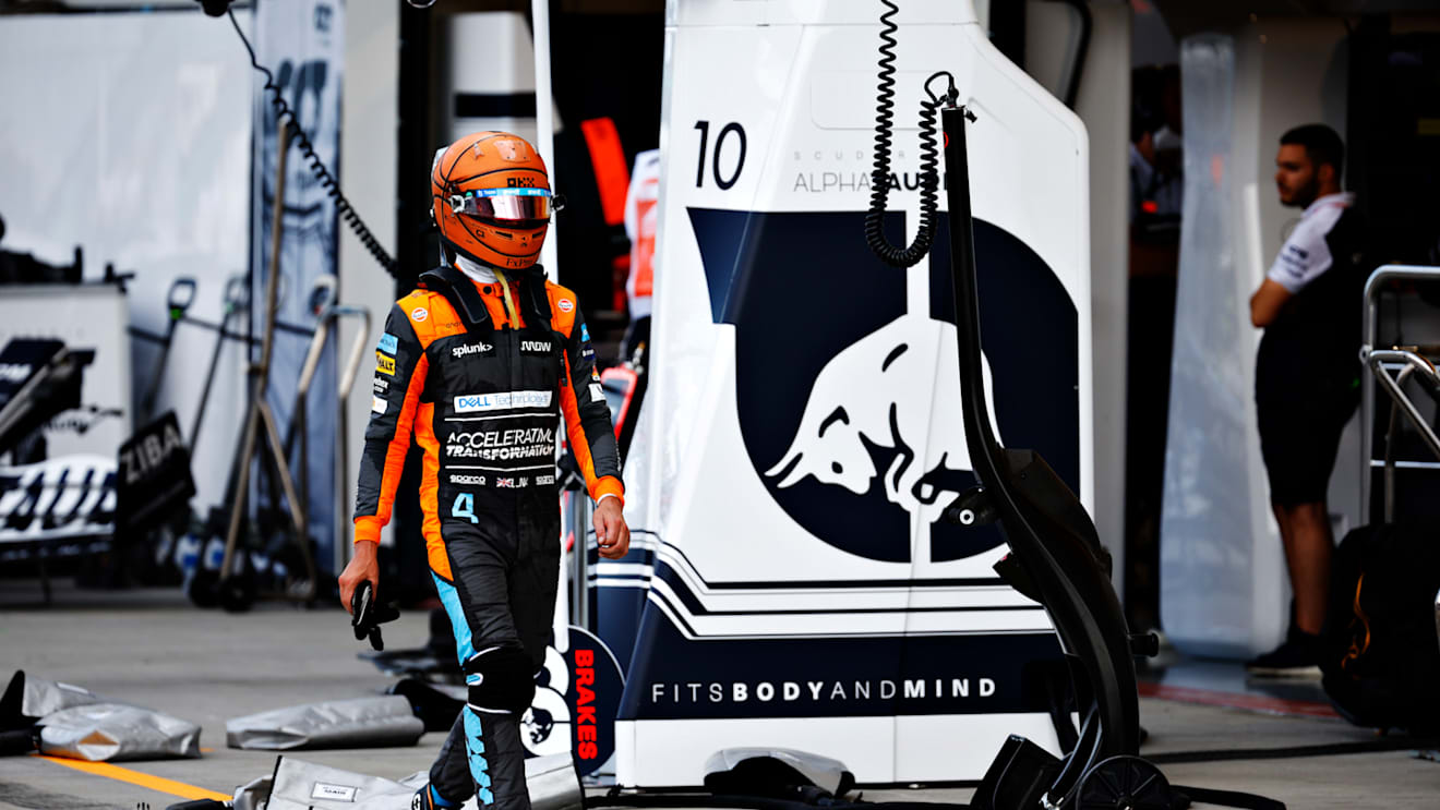 MIAMI, FLORIDA - MAY 08: Lando Norris of Great Britain and McLaren walks in the Pitlane after crashing out of the race during the F1 Grand Prix of Miami at the Miami International Autodrome on May 08, 2022 in Miami, Florida. (Photo by Jared C. Tilton/Getty Images)