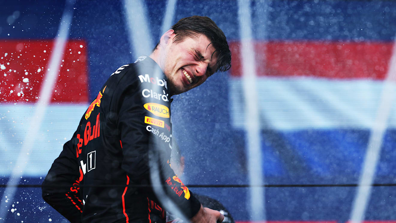 MIAMI, FLORIDA - MAY 08: Race winner Max Verstappen of the Netherlands and Oracle Red Bull Racing celebrates on the podium during the F1 Grand Prix of Miami at the Miami International Autodrome on May 08, 2022 in Miami, Florida. (Photo by Mark Thompson/Getty Images)