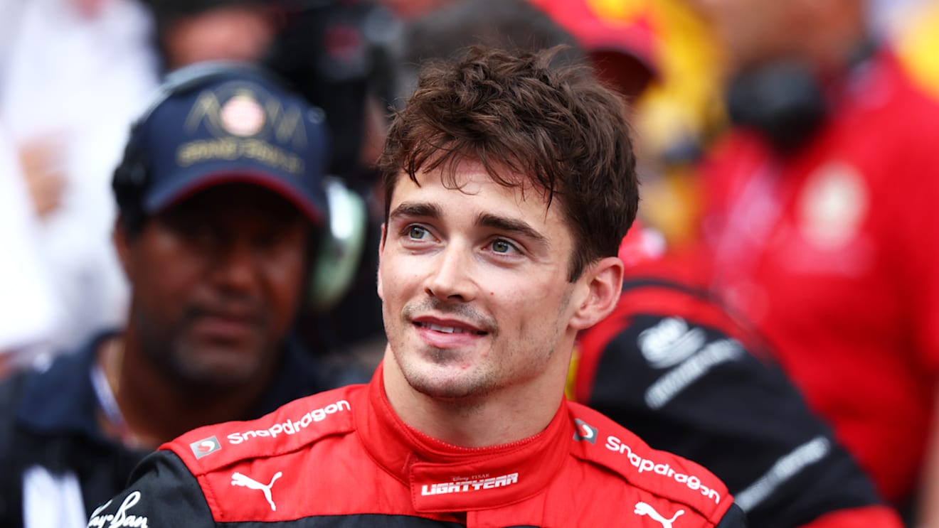 MONTE-CARLO, MONACO - MAY 28: Pole position qualifier Charles Leclerc of Monaco and Ferrari smiles in parc ferme during qualifying ahead of the F1 Grand Prix of Monaco at Circuit de Monaco on May 28, 2022 in Monte-Carlo, Monaco. (Photo by Clive Rose/Getty Images)