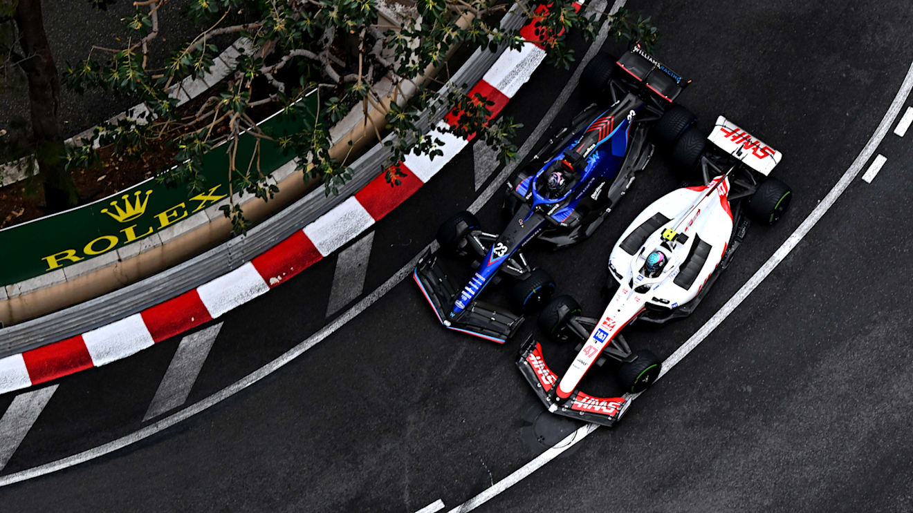 MONTE-CARLO, MONACO - MAY 29: Alexander Albon of Thailand driving the (23) Williams FW44 Mercedes and Mick Schumacher of Germany driving the (47) Haas F1 VF-22 Ferrari battle for track position during the F1 Grand Prix of Monaco at Circuit de Monaco on May 29, 2022 in Monte-Carlo, Monaco. (Photo by Clive Mason - Formula 1/Formula 1 via Getty Images)