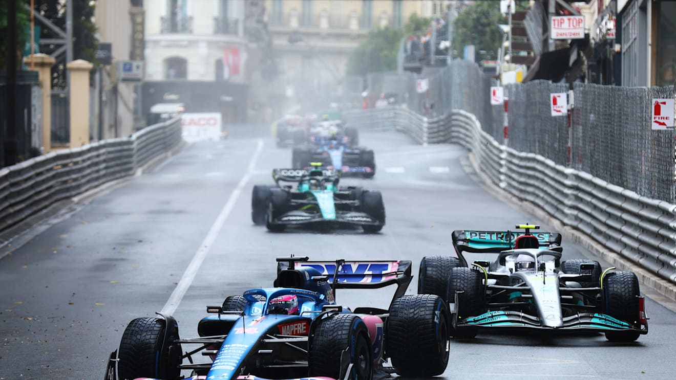 MONTE-CARLO, MONACO - MAY 29: Fernando Alonso of Spain driving the (14) Alpine F1 A522 Renault leads Lewis Hamilton of Great Britain driving the (44) Mercedes AMG Petronas F1 Team W13 during the F1 Grand Prix of Monaco at Circuit de Monaco on May 29, 2022 in Monte-Carlo, Monaco. (Photo by Clive Rose/Getty Images)
