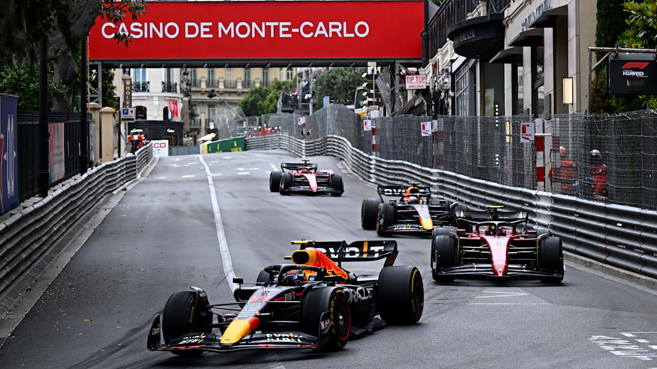 MONTE-CARLO, MONACO - MAY 29: Sergio Perez of Mexico driving the (11) Oracle Red Bull Racing RB18 leads Carlos Sainz of Spain driving (55) the Ferrari F1-75, Max Verstappen of the Netherlands driving the (1) Oracle Red Bull Racing RB18 and Charles Leclerc of Monaco driving the (16) Ferrari F1-75 during the F1 Grand Prix of Monaco at Circuit de Monaco on May 29, 2022 in Monte-Carlo, Monaco. (Photo by Clive Mason - Formula 1/Formula 1 via Getty Images)