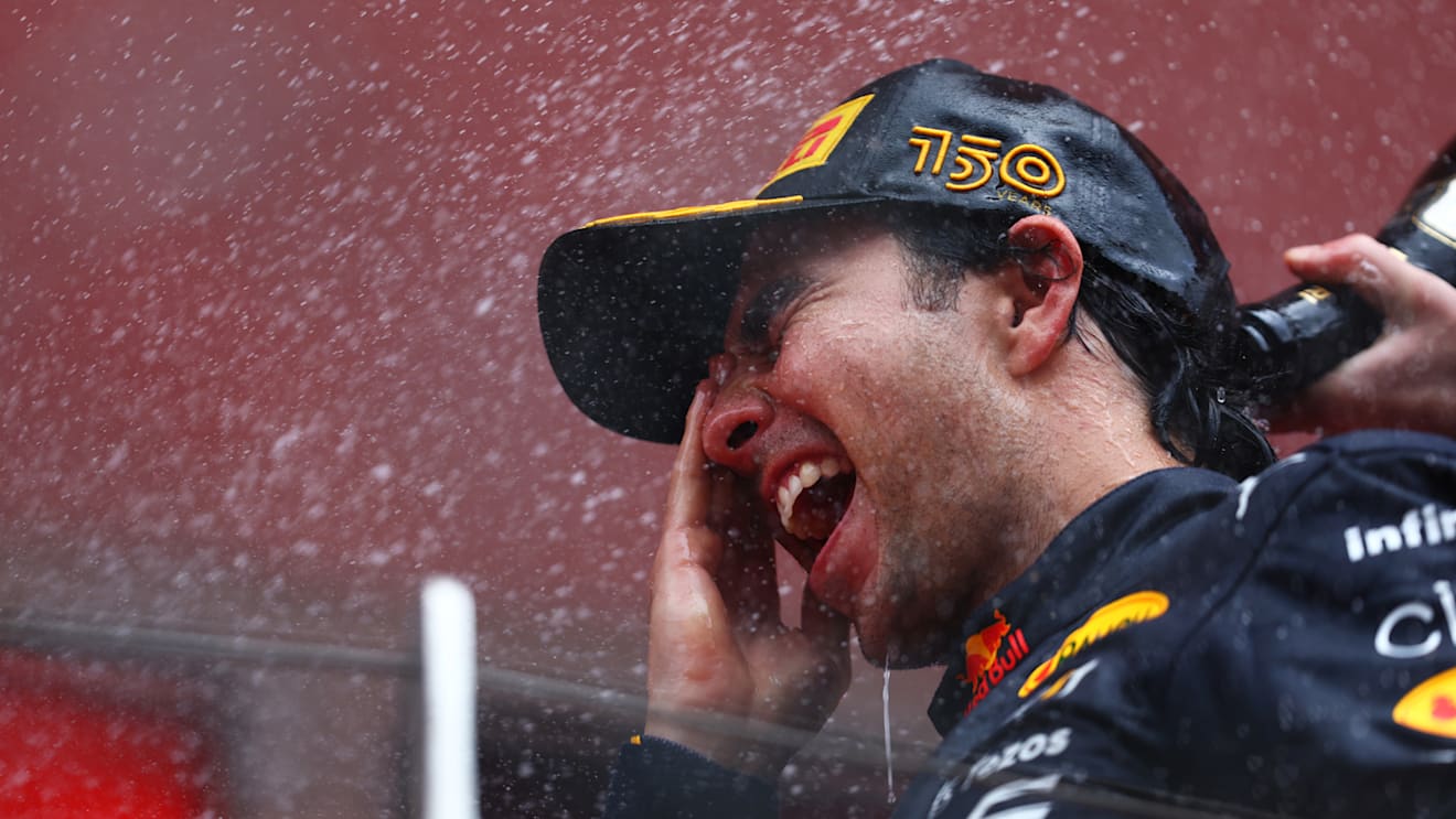 MONTE-CARLO, MONACO - MAY 29: Race winner Sergio Perez of Mexico and Oracle Red Bull Racing celebrates on the podium during the F1 Grand Prix of Monaco at Circuit de Monaco on May 29, 2022 in Monte-Carlo, Monaco. (Photo by Mark Thompson/Getty Images)