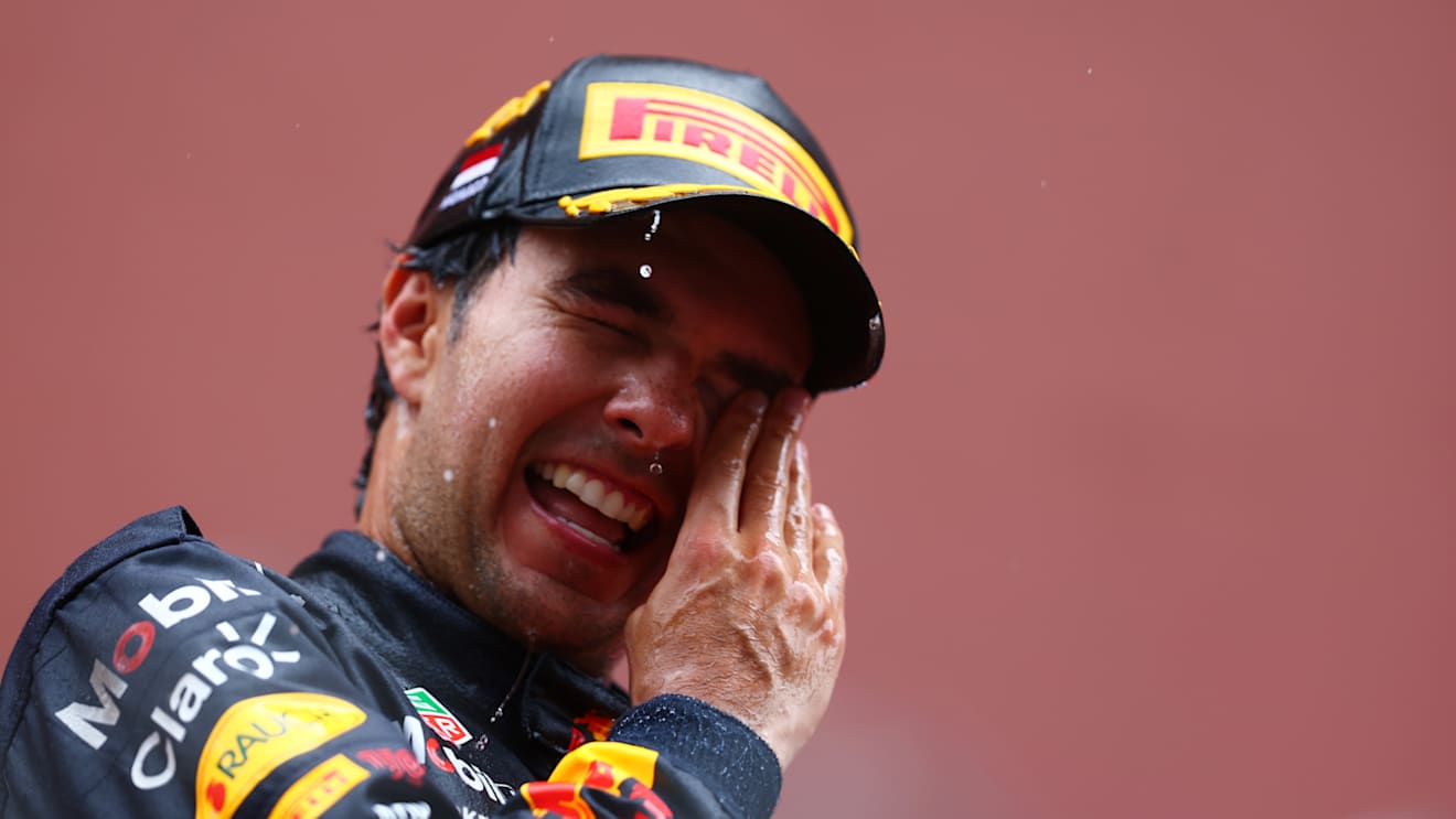 MONTE-CARLO, MONACO - MAY 29: Race winner Sergio Perez of Mexico and Oracle Red Bull Racing celebrates on the podium during the F1 Grand Prix of Monaco at Circuit de Monaco on May 29, 2022 in Monte-Carlo, Monaco. (Photo by Mark Thompson/Getty Images)