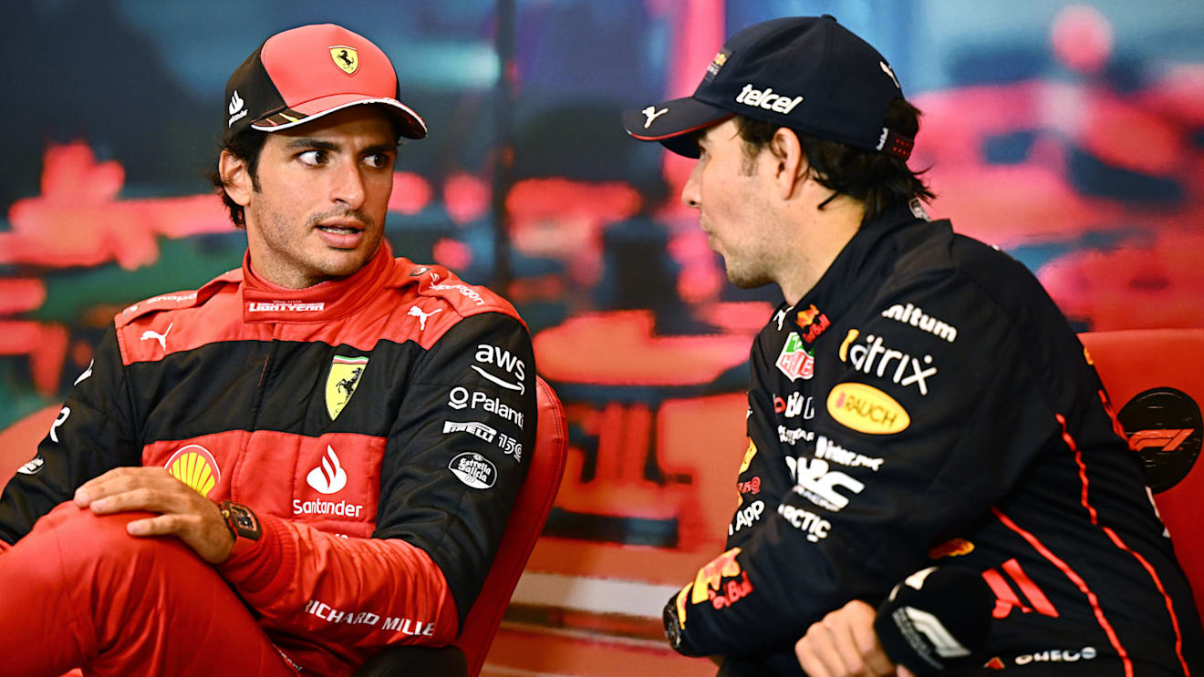 MONTE-CARLO, MONACO - MAY 29: Race winner Sergio Perez of Mexico and Oracle Red Bull Racing and Second placed Carlos Sainz of Spain and Ferrari talk in the press conference after the F1 Grand Prix of Monaco at Circuit de Monaco on May 29, 2022 in Monte-Carlo, Monaco. (Photo by Clive Mason/Getty Images)