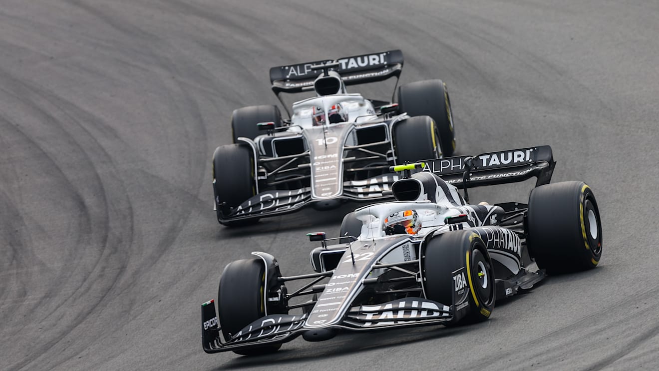 ZANDVOORT, NETHERLANDS - SEPTEMBER 04: Yuki Tsunoda of Scuderia AlphaTauri and Japan leads Pierre Gasly of Scuderia AlphaTauri and France  during the F1 Grand Prix of The Netherlands at Circuit Zandvoort on September 04, 2022 in Zandvoort, Netherlands. (Photo by Peter Fox/Getty Images)