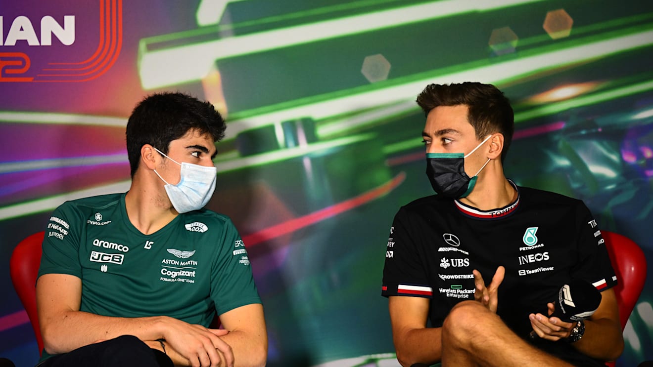 JEDDAH, SAUDI ARABIA - MARCH 25: Lance Stroll of Canada and Aston Martin F1 Team and George Russell of Great Britain and Mercedes talk in the Drivers Press Conference before practice ahead of the F1 Grand Prix of Saudi Arabia at the Jeddah Corniche Circuit on March 25, 2022 in Jeddah, Saudi Arabia. (Photo by Clive Mason/Getty Images)