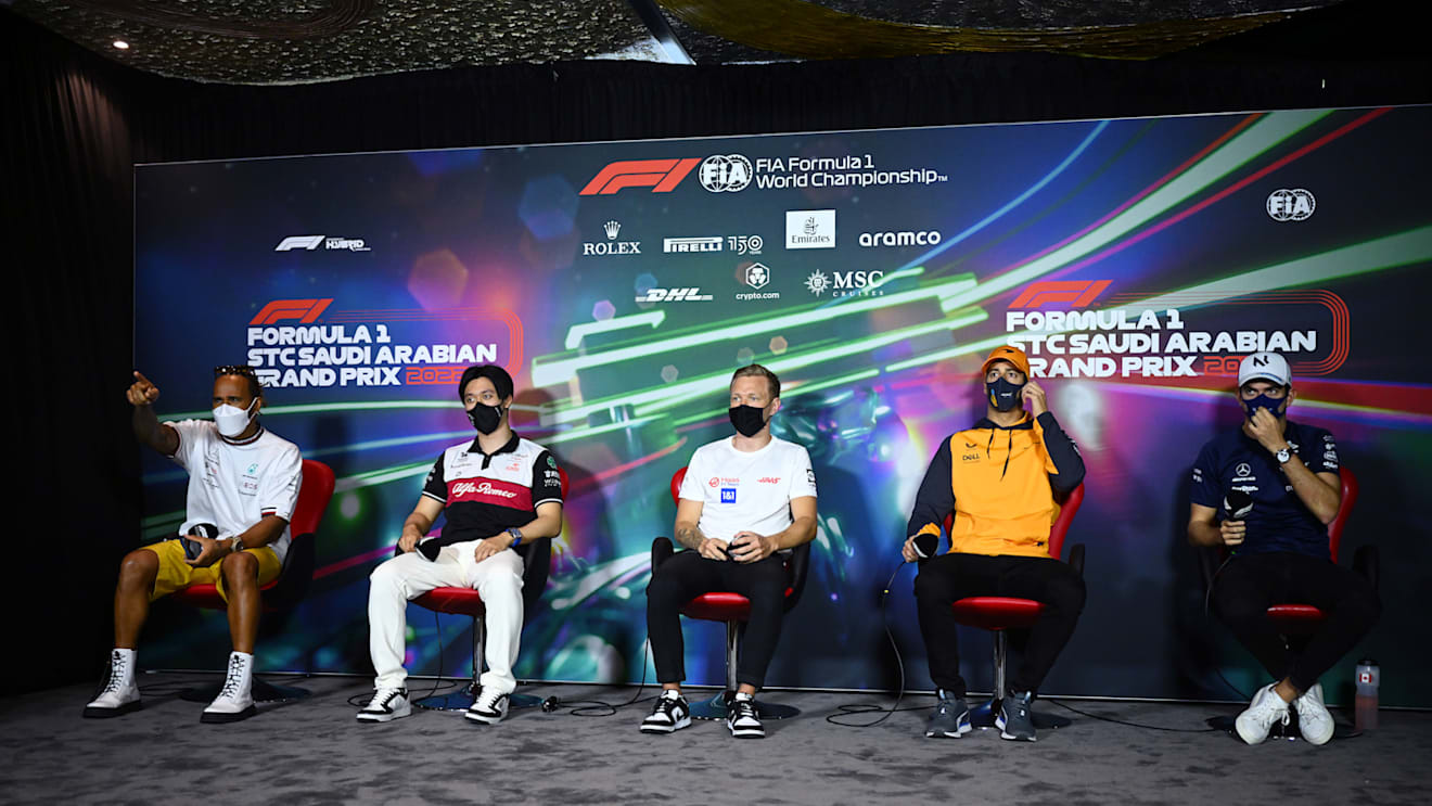 JEDDAH, SAUDI ARABIA - MARCH 25: (L-R) Lewis Hamilton of Great Britain and Mercedes, Zhou Guanyu of China and Alfa Romeo F1, Kevin Magnussen of Denmark and Haas F1, Daniel Ricciardo of Australia and McLaren and Nicholas Latifi of Canada and Williams attend the Drivers Press Conference before practice ahead of the F1 Grand Prix of Saudi Arabia at the Jeddah Corniche Circuit on March 25, 2022 in Jeddah, Saudi Arabia. (Photo by Clive Mason/Getty Images)