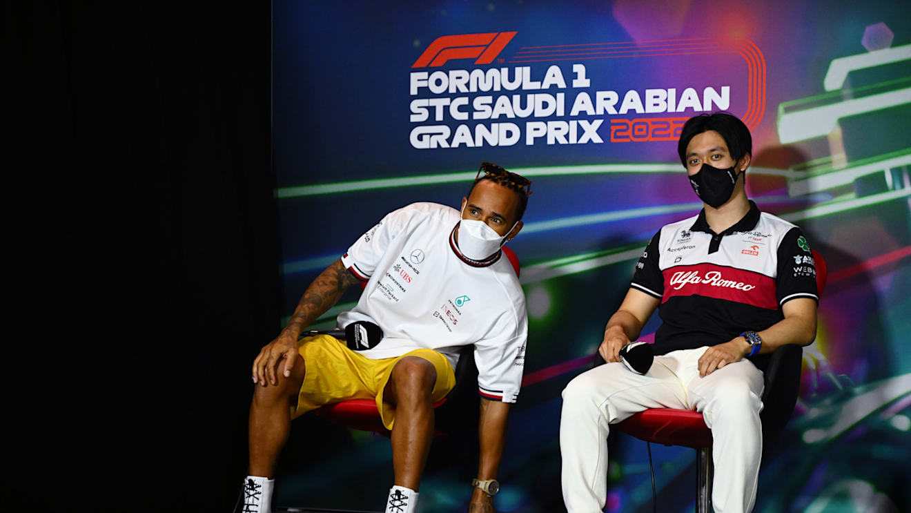 JEDDAH, SAUDI ARABIA - MARCH 25: Lewis Hamilton of Great Britain and Mercedes and Zhou Guanyu of China and Alfa Romeo F1 attend the Drivers Press Conference before practice ahead of the F1 Grand Prix of Saudi Arabia at the Jeddah Corniche Circuit on March 25, 2022 in Jeddah, Saudi Arabia. (Photo by Clive Mason/Getty Images)