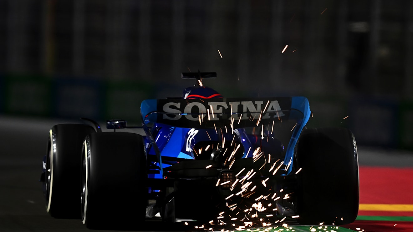 JEDDAH, SAUDI ARABIA - MARCH 25: Sparks fly behind Alexander Albon of Thailand driving the (23) Williams FW44 Mercedes on track during practice ahead of the F1 Grand Prix of Saudi Arabia at the Jeddah Corniche Circuit on March 25, 2022 in Jeddah, Saudi Arabia. (Photo by Clive Mason/Getty Images)