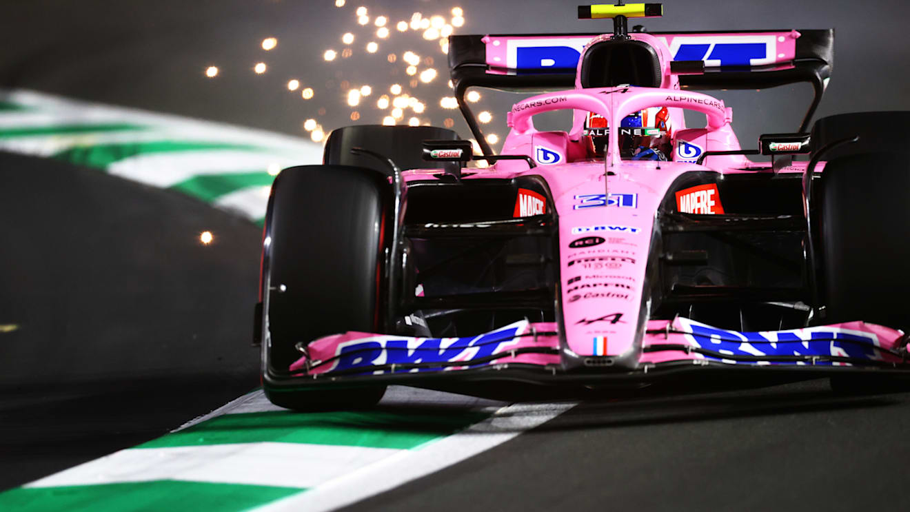 JEDDAH, SAUDI ARABIA - MARCH 26: Sparks fly behind Esteban Ocon of France driving the (31) Alpine F1 A522 Renault during qualifying ahead of the F1 Grand Prix of Saudi Arabia at the Jeddah Corniche Circuit on March 26, 2022 in Jeddah, Saudi Arabia. (Photo by Dan Istitene - Formula 1/Formula 1 via Getty Images)