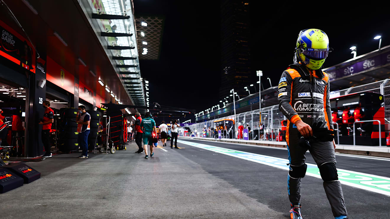 JEDDAH, SAUDI ARABIA - MARCH 26: Lando Norris of Great Britain and McLaren walks in the Pitlane after qualifying in 11th position during qualifying ahead of the F1 Grand Prix of Saudi Arabia at the Jeddah Corniche Circuit on March 26, 2022 in Jeddah, Saudi Arabia. (Photo by Mark Thompson/Getty Images)