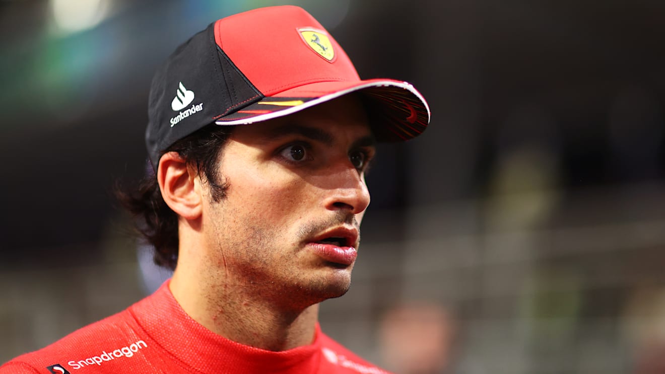JEDDAH, SAUDI ARABIA - MARCH 26: Third placed qualifier Carlos Sainz of Spain and Ferrari walks in parc ferme during qualifying ahead of the F1 Grand Prix of Saudi Arabia at the Jeddah Corniche Circuit on March 26, 2022 in Jeddah, Saudi Arabia. (Photo by Dan Istitene - Formula 1/Formula 1 via Getty Images)