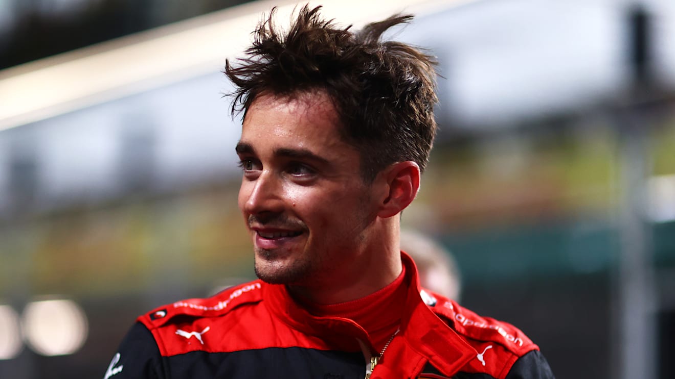 JEDDAH, SAUDI ARABIA - MARCH 26: Second placed qualifier Charles Leclerc of Monaco and Ferrari smiles in parc ferme during qualifying ahead of the F1 Grand Prix of Saudi Arabia at the Jeddah Corniche Circuit on March 26, 2022 in Jeddah, Saudi Arabia. (Photo by Dan Istitene - Formula 1/Formula 1 via Getty Images)