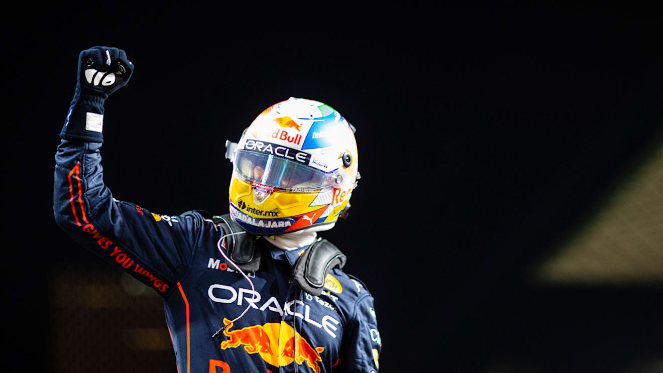 JEDDAH, SAUDI ARABIA - MARCH 26: Pole position qualifier Sergio Perez of Mexico and Oracle Red Bull Racing celebrates in parc ferme during qualifying ahead of the F1 Grand Prix of Saudi Arabia at the Jeddah Corniche Circuit on March 26, 2022 in Jeddah, Saudi Arabia. (Photo by Dan Istitene - Formula 1/Formula 1 via Getty Images)