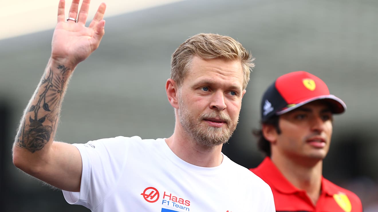 JEDDAH, SAUDI ARABIA - MARCH 27: Kevin Magnussen of Denmark and Haas F1 waves to the crowd from the drivers parade ahead of the F1 Grand Prix of Saudi Arabia at the Jeddah Corniche Circuit on March 27, 2022 in Jeddah, Saudi Arabia. (Photo by Dan Istitene - Formula 1/Formula 1 via Getty Images)