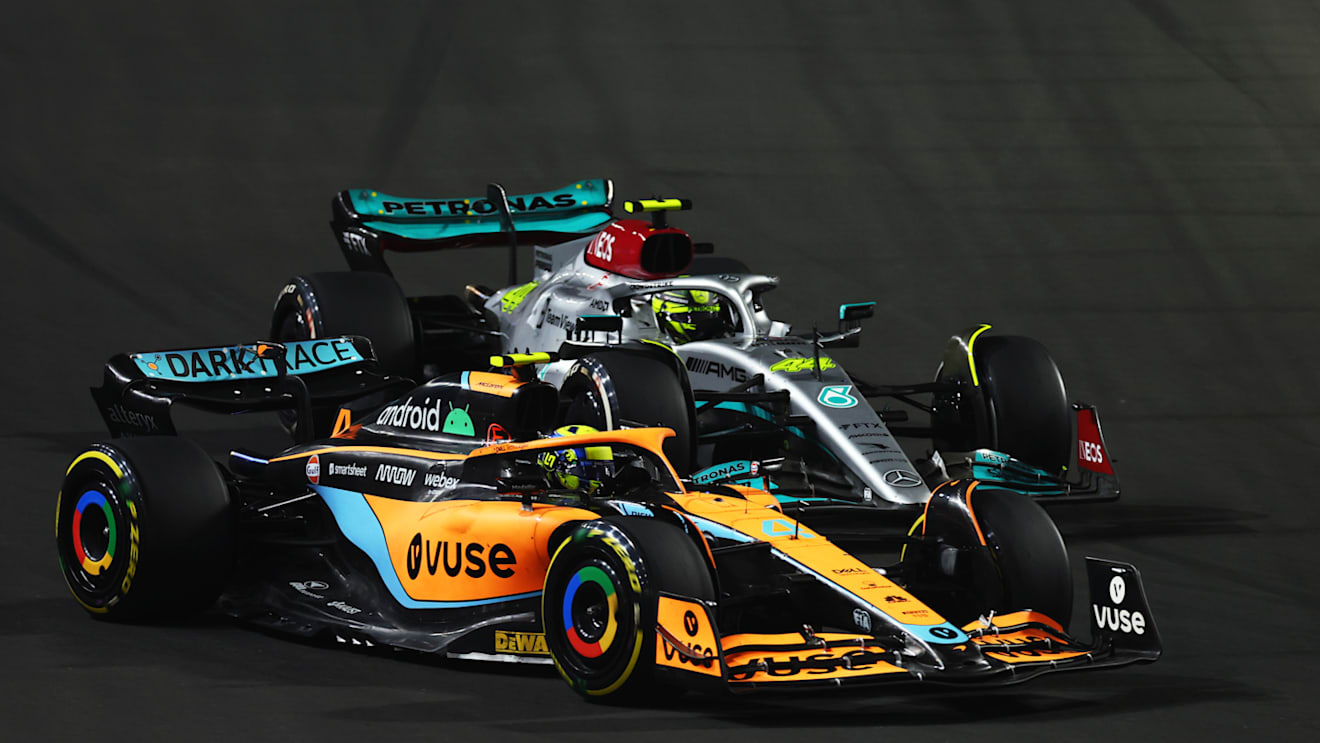 JEDDAH, SAUDI ARABIA - MARCH 27: Lando Norris of Great Britain driving the (4) McLaren MCL36 Mercedes leads Lewis Hamilton of Great Britain driving the (44) Mercedes AMG Petronas F1 Team W13  during the F1 Grand Prix of Saudi Arabia at the Jeddah Corniche Circuit on March 27, 2022 in Jeddah, Saudi Arabia. (Photo by Lars Baron/Getty Images)