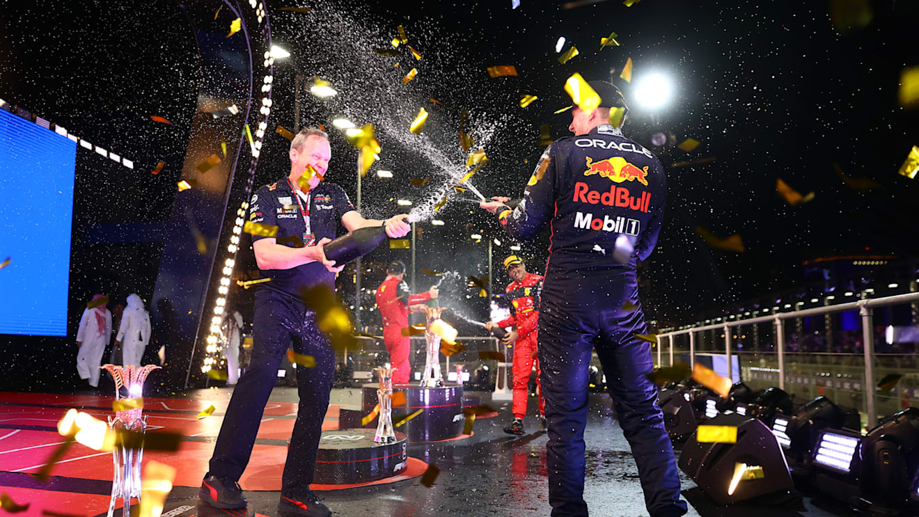 JEDDAH, SAUDI ARABIA - MARCH 27: Race winner Max Verstappen of the Netherlands and Oracle Red Bull Racing and Red Bull Racing Head of Car Engineering Paul Monaghan celebrate on the podium during the F1 Grand Prix of Saudi Arabia at the Jeddah Corniche Circuit on March 27, 2022 in Jeddah, Saudi Arabia. (Photo by Dan Istitene - Formula 1/Formula 1 via Getty Images)