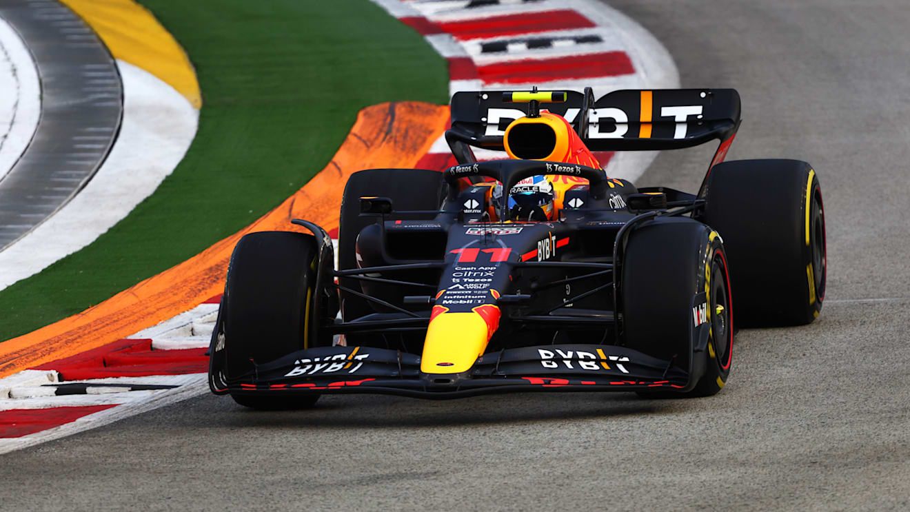 SINGAPORE, SINGAPORE - SEPTEMBER 30: Sergio Perez of Mexico driving the (11) Oracle Red Bull Racing RB18 on track during practice ahead of the F1 Grand Prix of Singapore at Marina Bay Street Circuit on September 30, 2022 in Singapore, Singapore. (Photo by Bryn Lennon - Formula 1/Formula 1 via Getty Images)
