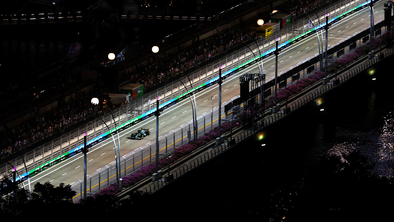 SINGAPORE, SINGAPORE - SEPTEMBER 30: Sebastian Vettel of Germany driving the (5) Aston Martin AMR22 Mercedes on track during practice ahead of the F1 Grand Prix of Singapore at Marina Bay Street Circuit on September 30, 2022 in Singapore, Singapore. (Photo by Bryn Lennon - Formula 1/Formula 1 via Getty Images)