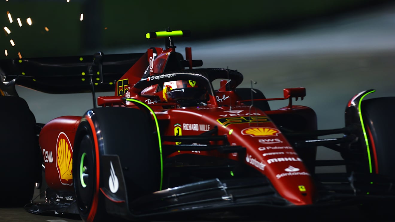SINGAPORE, SINGAPORE - SEPTEMBER 30: Carlos Sainz of Spain driving (55) the Ferrari F1-75 on track during practice ahead of the F1 Grand Prix of Singapore at Marina Bay Street Circuit on September 30, 2022 in Singapore, Singapore. (Photo by Mark Thompson/Getty Images,)