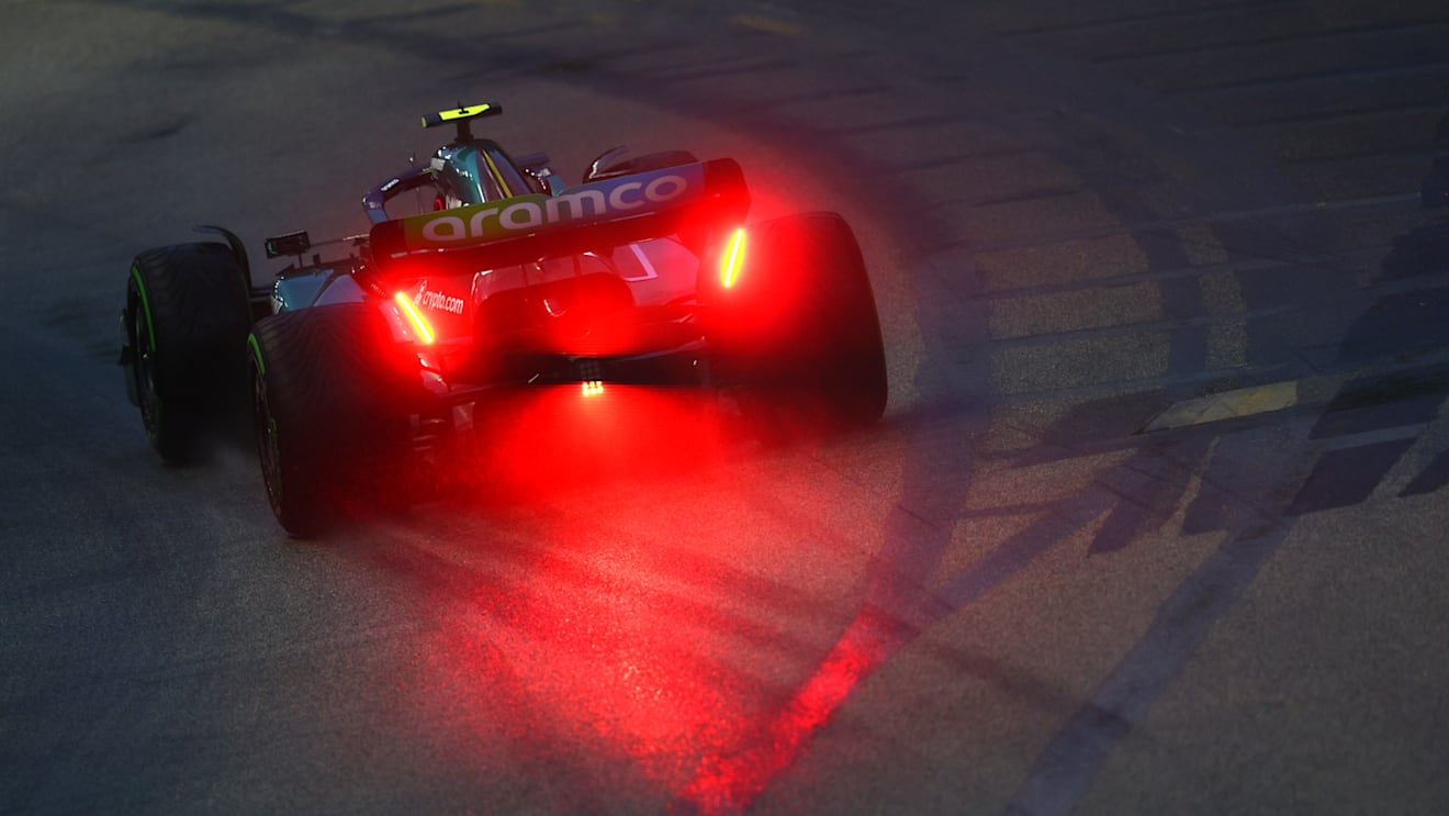 SINGAPORE, SINGAPORE - OCTOBER 01: Sebastian Vettel of Germany driving the (5) Aston Martin AMR22 Mercedes on track during final practice ahead of the F1 Grand Prix of Singapore at Marina Bay Street Circuit on October 01, 2022 in Singapore, Singapore. (Photo by Clive Rose/Getty Images,)