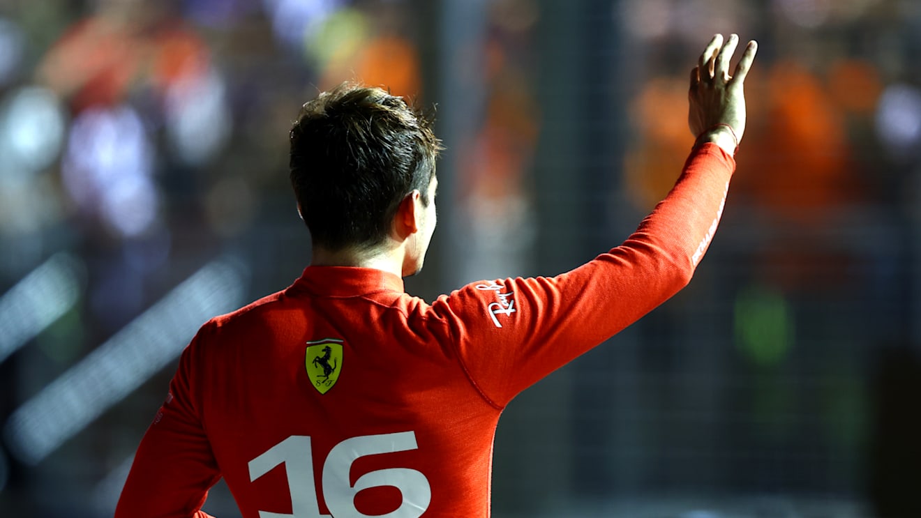 SINGAPORE, SINGAPORE - OCTOBER 01: Pole position qualifier Charles Leclerc of Monaco and Ferrari celebrates in parc ferme during qualifying ahead of the F1 Grand Prix of Singapore at Marina Bay Street Circuit on October 01, 2022 in Singapore, Singapore. (Photo by Mark Thompson/Getty Images,)