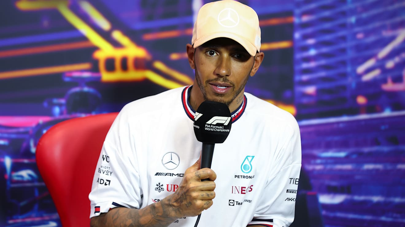 SINGAPORE, SINGAPORE - OCTOBER 01: Third placed qualifier Lewis Hamilton of Great Britain and Mercedes attends the press conference after qualifying ahead of the F1 Grand Prix of Singapore at Marina Bay Street Circuit on October 01, 2022 in Singapore, Singapore. (Photo by Dan Istitene/Getty Images)