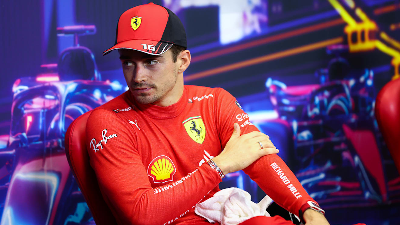 SINGAPORE, SINGAPORE - OCTOBER 01: Pole position qualifier Charles Leclerc of Monaco and Ferrari attends the press conference after qualifying ahead of the F1 Grand Prix of Singapore at Marina Bay Street Circuit on October 01, 2022 in Singapore, Singapore. (Photo by Dan Istitene/Getty Images)