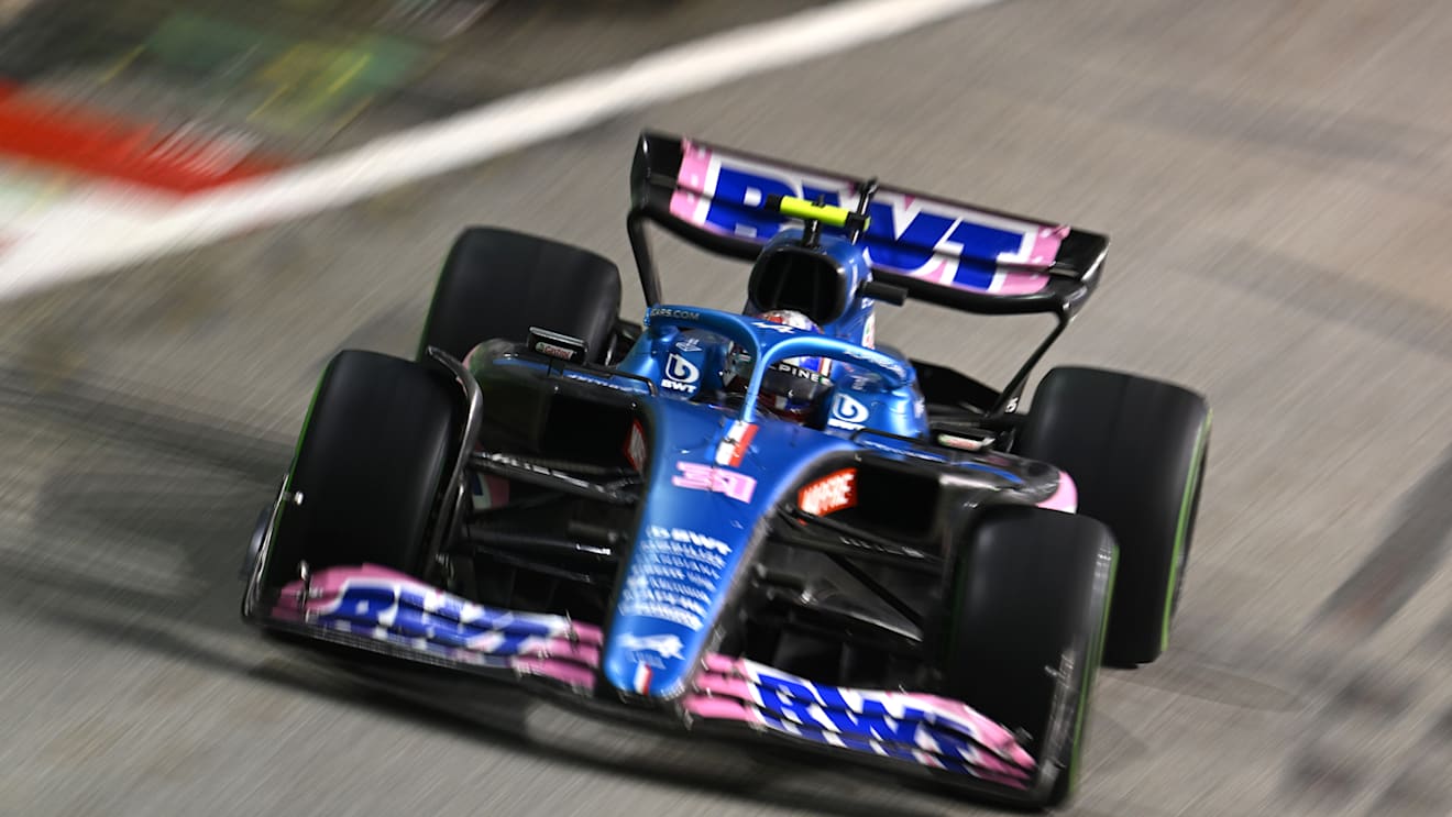 SINGAPORE, SINGAPORE - OCTOBER 02: Esteban Ocon of France driving the (31) Alpine F1 A522 Renault on track during the F1 Grand Prix of Singapore at Marina Bay Street Circuit on October 02, 2022 in Singapore, Singapore. (Photo by Clive Mason/Getty Images,)