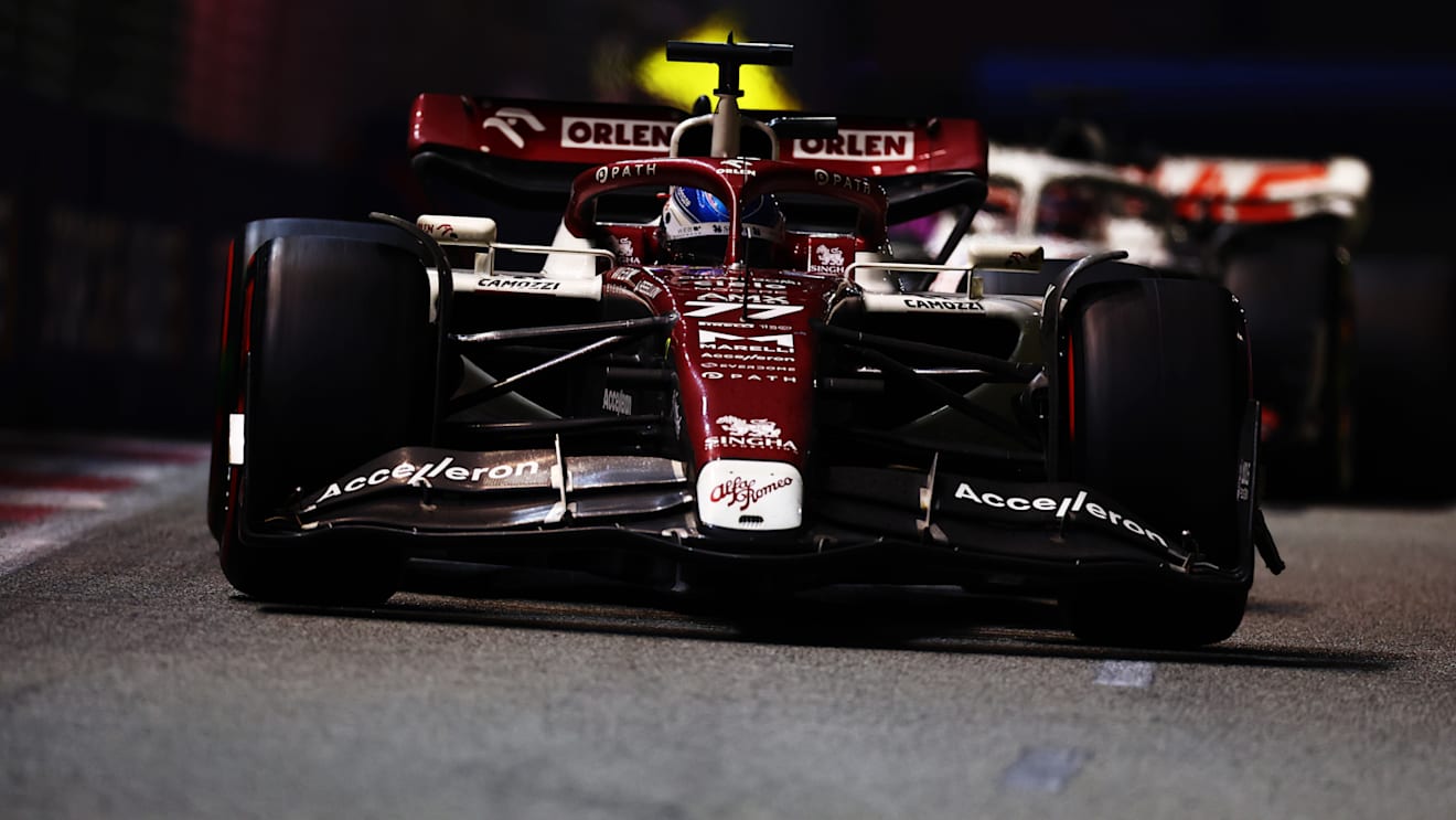 SINGAPORE, SINGAPORE - OCTOBER 02: Valtteri Bottas of Finland driving the (77) Alfa Romeo F1 C42 Ferrari on track during the F1 Grand Prix of Singapore at Marina Bay Street Circuit on October 02, 2022 in Singapore, Singapore. (Photo by Mark Thompson/Getty Images,)
