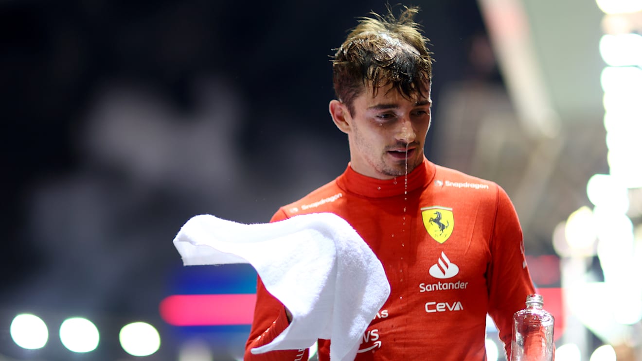 SINGAPORE, SINGAPORE - OCTOBER 02: Second placed Charles Leclerc of Monaco and Ferrari looks on in parc ferme during the F1 Grand Prix of Singapore at Marina Bay Street Circuit on October 02, 2022 in Singapore, Singapore. (Photo by Dan Istitene - Formula 1/Formula 1 via Getty Images)
