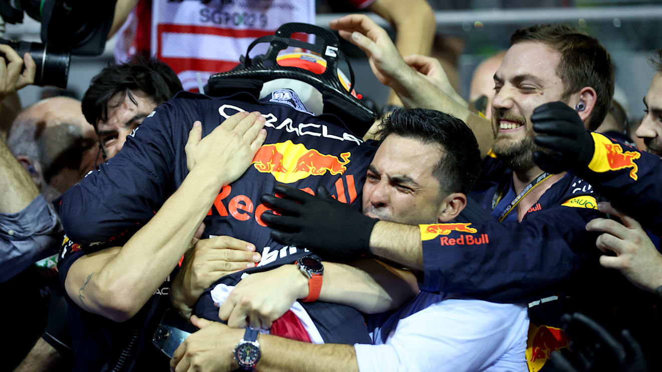 SINGAPORE, SINGAPORE - OCTOBER 02: Race winner Sergio Perez of Mexico and Oracle Red Bull Racing celebrates in parc ferme during the F1 Grand Prix of Singapore at Marina Bay Street Circuit on October 02, 2022 in Singapore, Singapore. (Photo by Dan Istitene - Formula 1/Formula 1 via Getty Images)