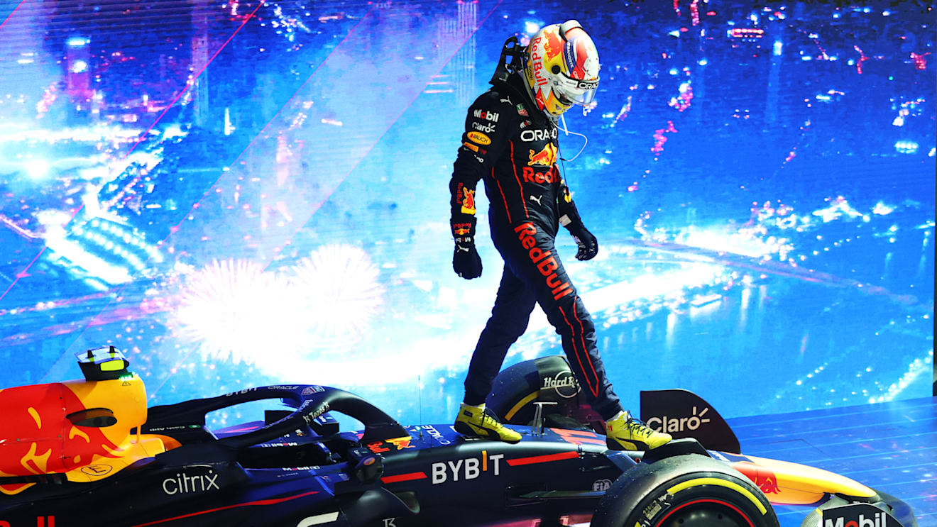 SINGAPORE, SINGAPORE - OCTOBER 02: Race winner Sergio Perez of Mexico and Oracle Red Bull Racing celebrates in parc ferme during the F1 Grand Prix of Singapore at Marina Bay Street Circuit on October 02, 2022 in Singapore, Singapore. (Photo by Clive Rose/Getty Images,)