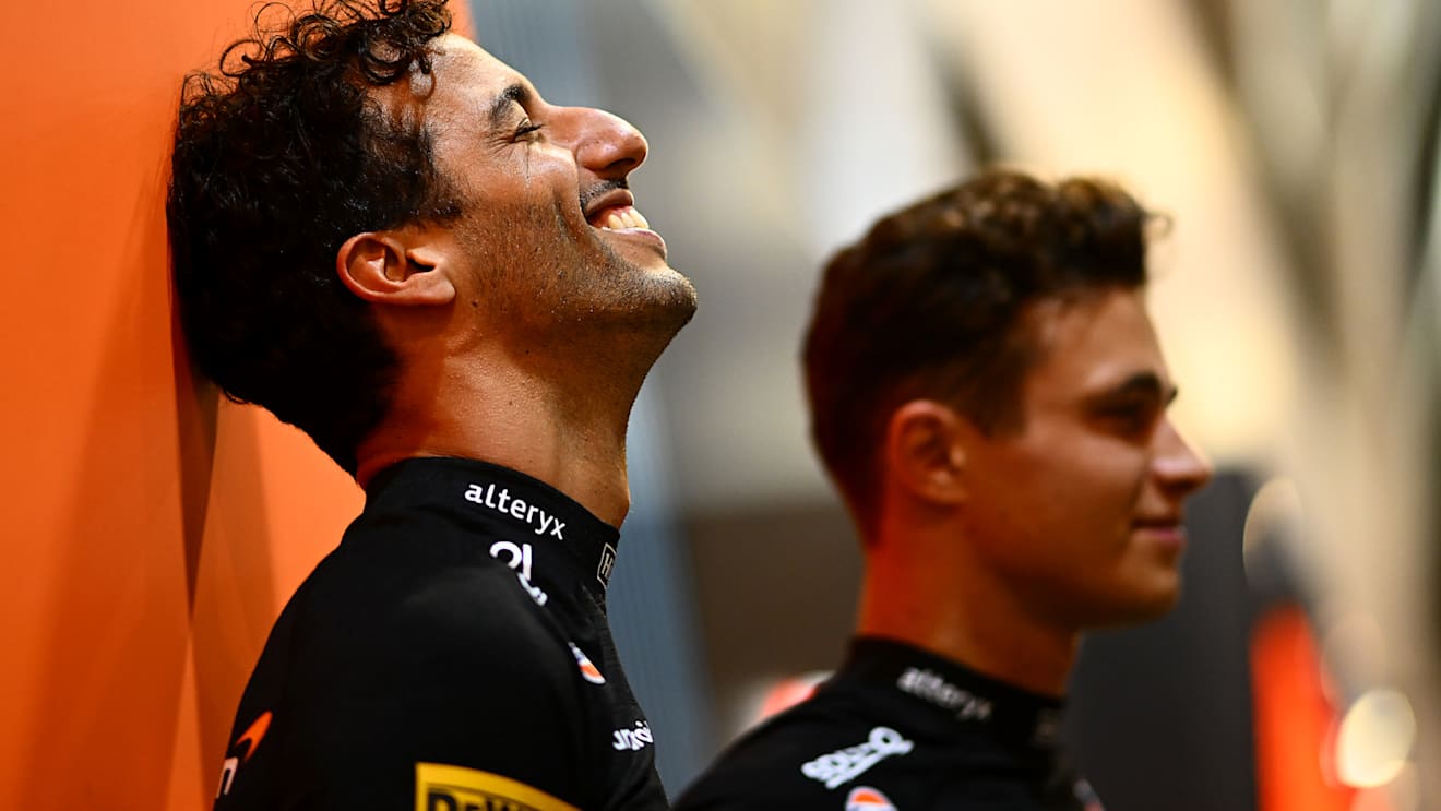 SINGAPORE, SINGAPORE - SEPTEMBER 29: Daniel Ricciardo of Australia and McLaren and Lando Norris of Great Britain and McLaren look on in the Paddock during previews ahead of the F1 Grand Prix of Singapore at Marina Bay Street Circuit on September 29, 2022 in Singapore, Singapore. (Photo by Clive Mason/Getty Images,)